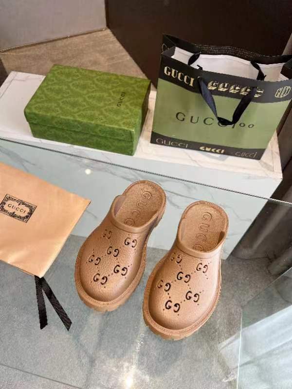 Gucci GG Slides perforated carved shoes A
