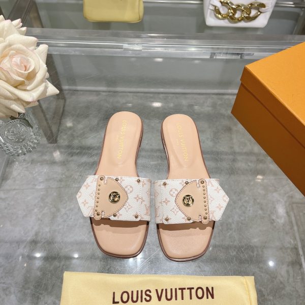 Louis Vuitton studded slippers white